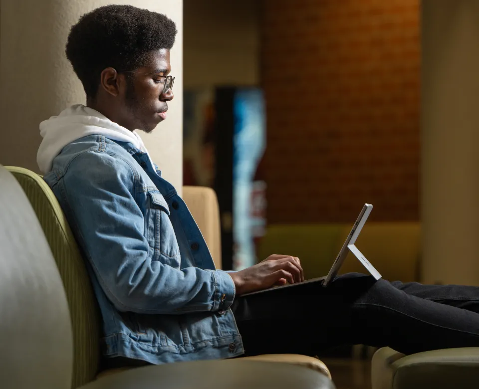 student works on a tablet