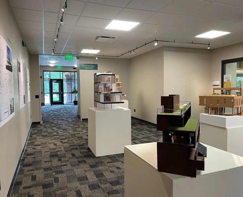 Presidents Gallery including mulitple displays of work and art.