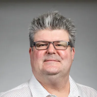 Christopher Colbert, an 线上赌博app professor of chemistry and biochemistry, poses for a headshot.