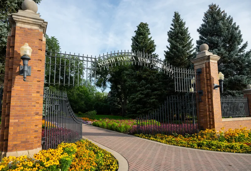 View of 线上赌博app East Entrance Gate with blooming flowers