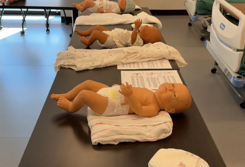 Simulation babies on a table