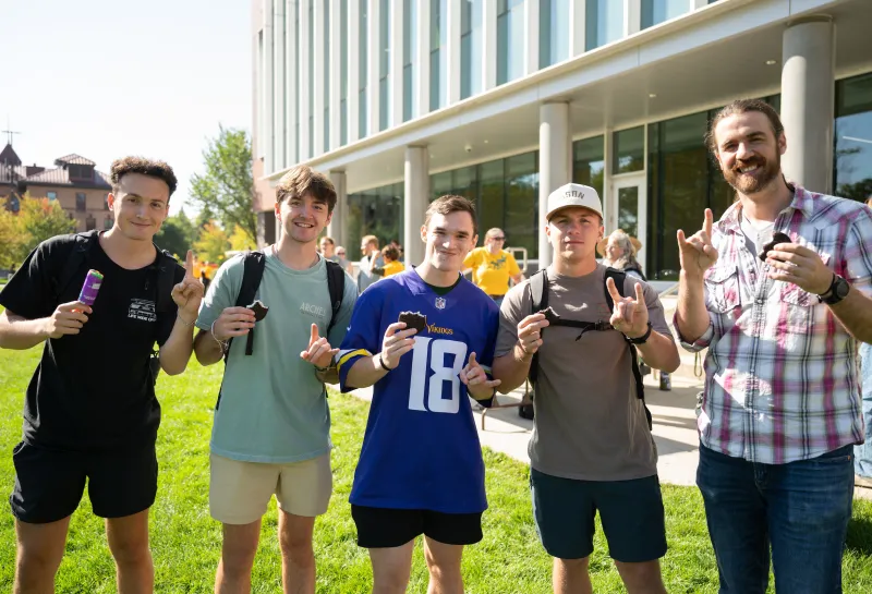 students giving Bison horns and eating ice cream treats as part of Homecoming 2025 events
