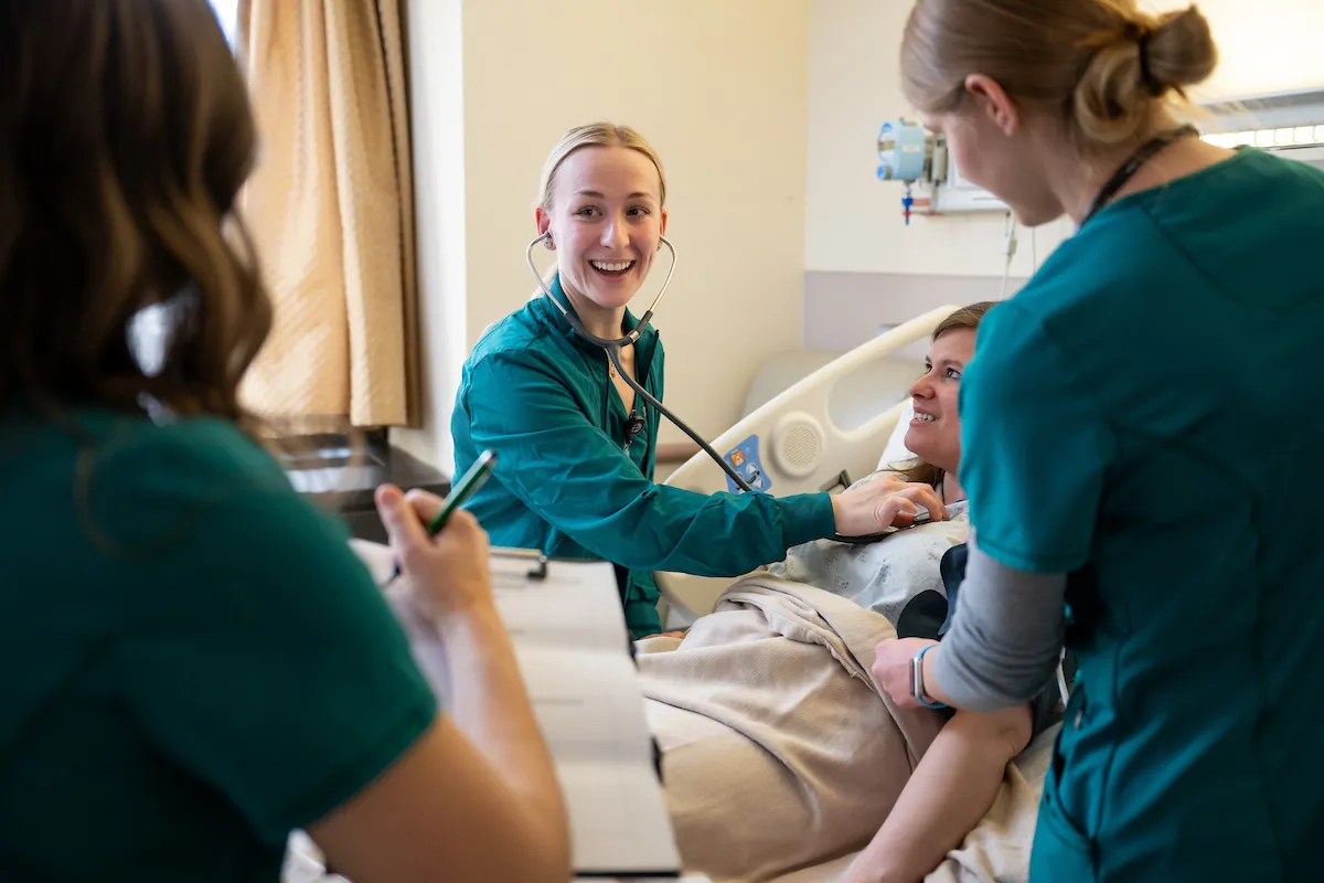 nursing students discussing a patient's needs