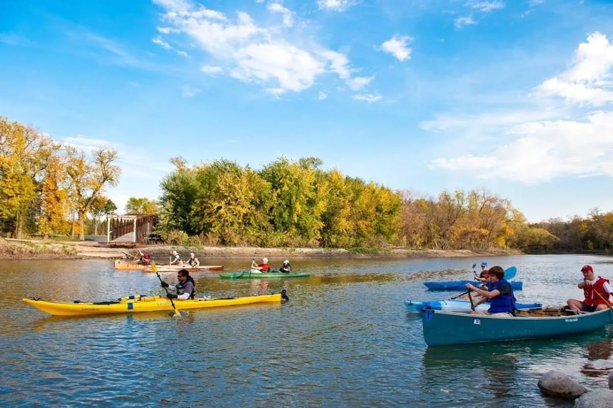 Three kayakers on the Red River.