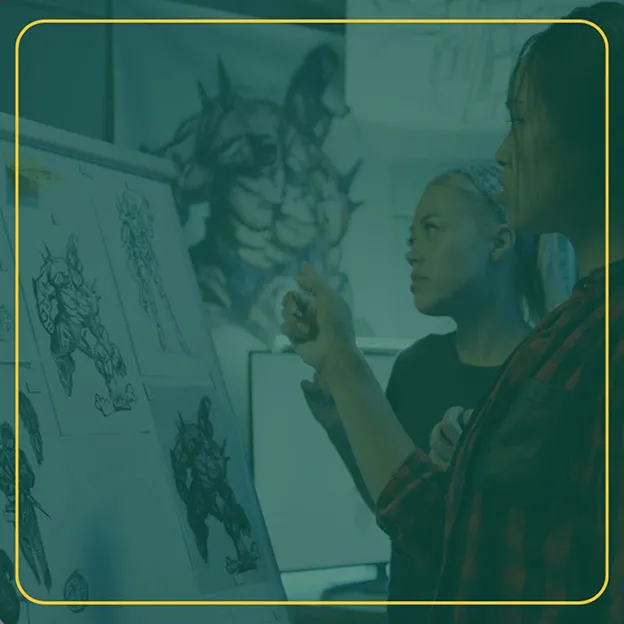 Two people sketching designs and evaluating sketches