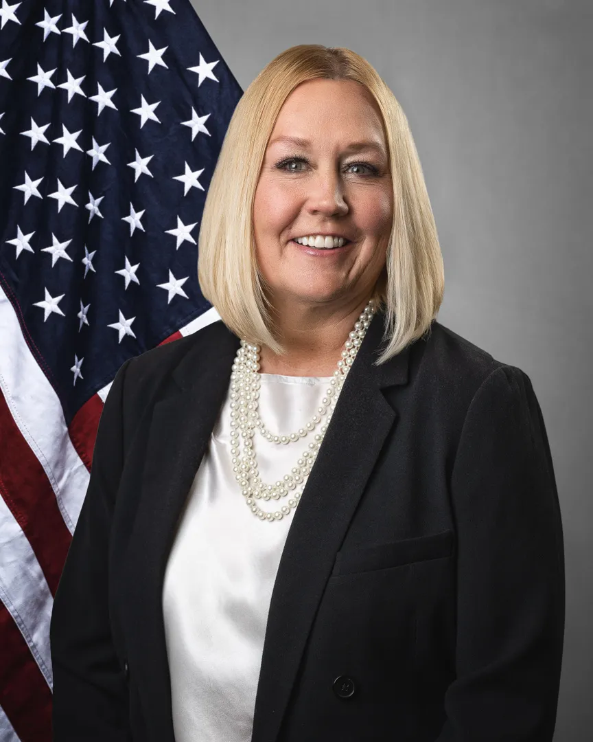 Denise Kolpack smiling confidently at camera. 