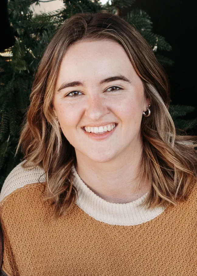 Kristen Setien looking confidently at camera.