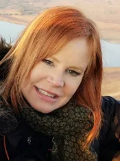 Kara Careaga smiling confidenlty at camera.