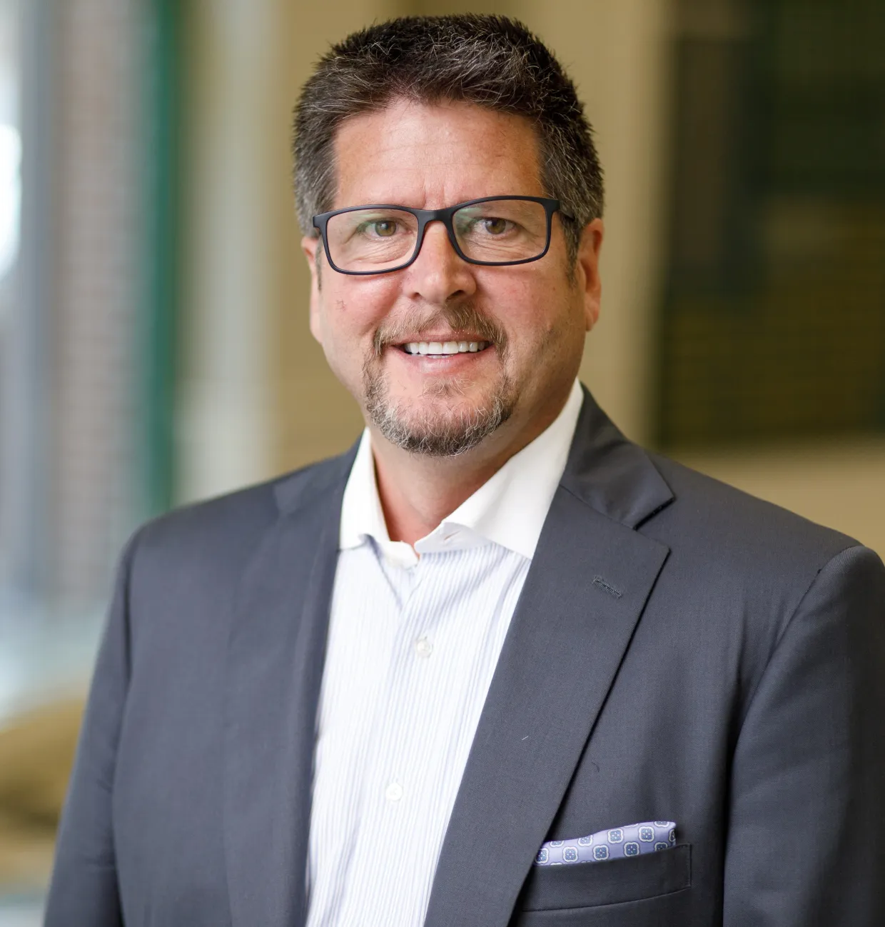 Michael Gjesdahl smiling confidently at camera.