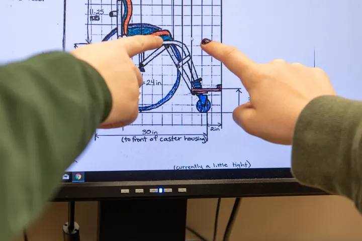 Students work on wheelchair project