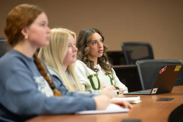 business students listen during class lecture