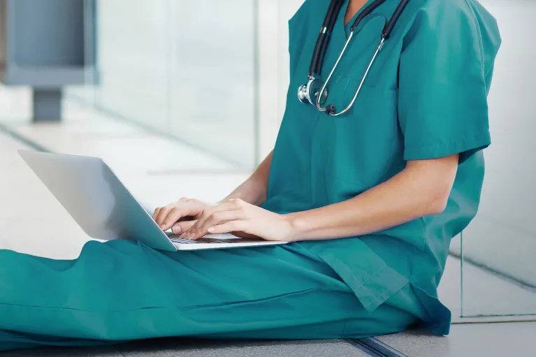 image of student on laptop
