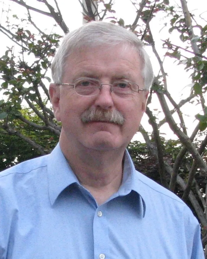 Gary smiling at the camera